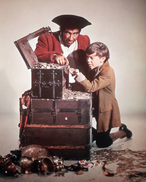Robert Newton as Long John Silver and Bobby Driscoll as Jim Hawkin- Old Photo