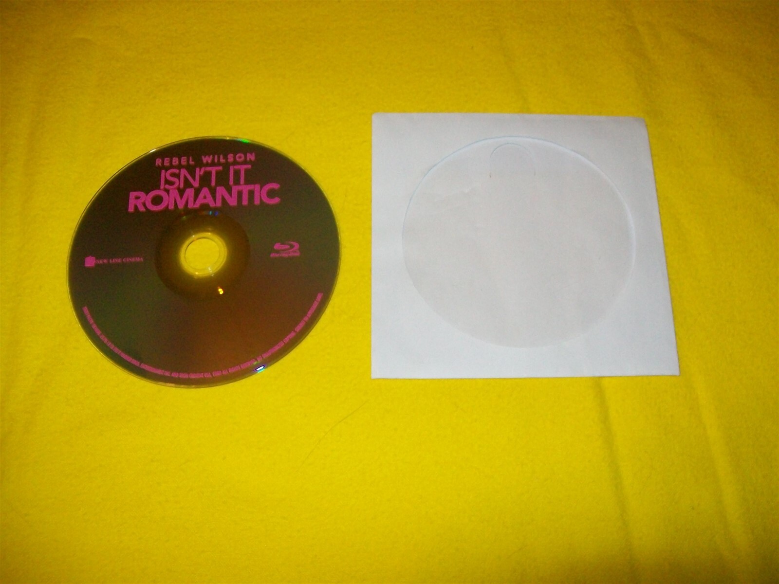 ISN’T IT ROMANTIC BLURAY DISC ONLY NO CASE IS INCLUDED REBEL WILSON ADAM DEVINE