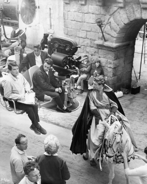 Director Peter Glenville talking with Peter O’Toole in between sho- Old Photo
