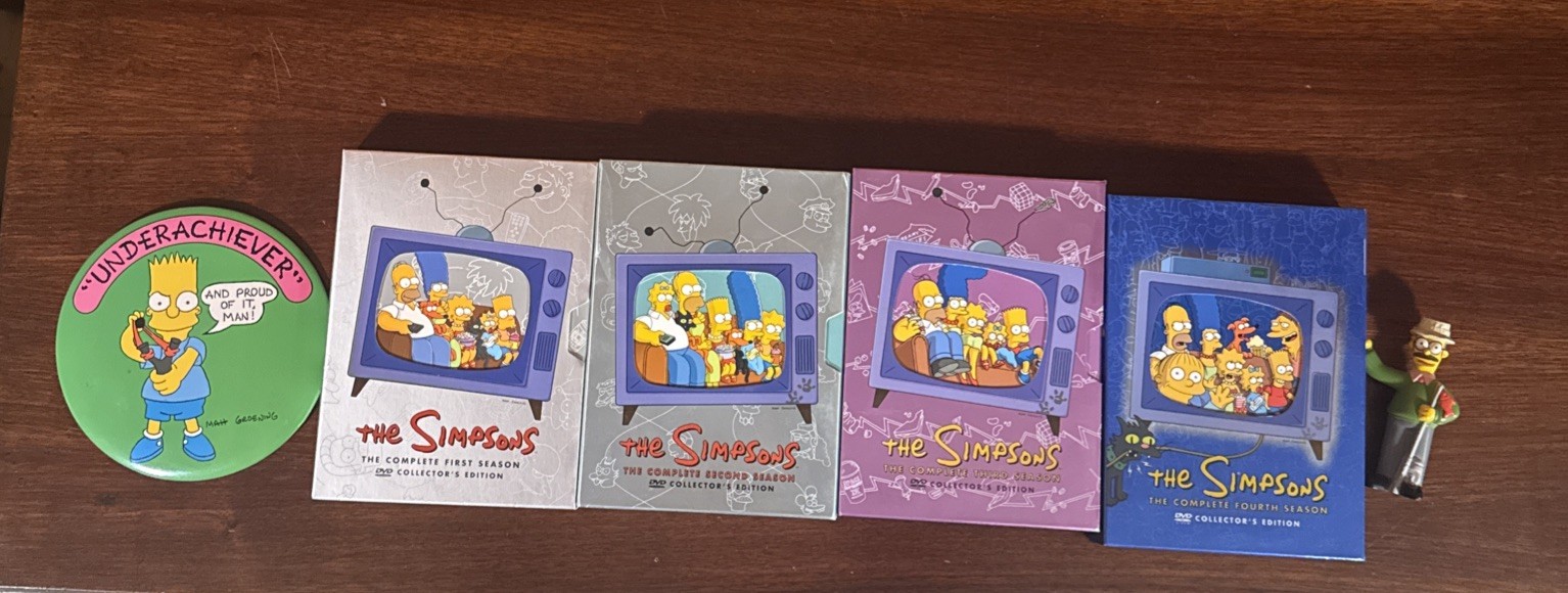The Simpsons Collector’s Edition DVD Box Sets + Button And Figurine