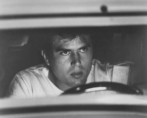 Paul Le Mat driving car in the 1973 George Lucas movie American Gr- Old Photo