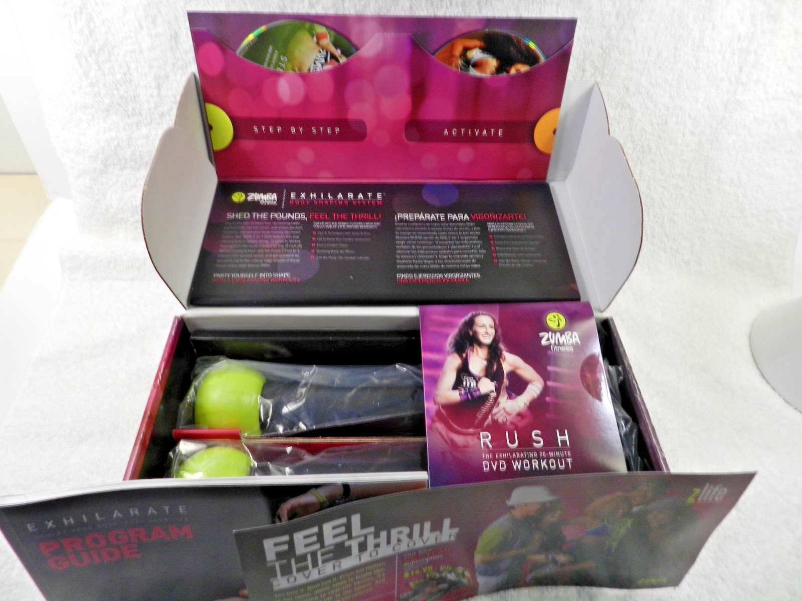 Zumba Fitness Exhilarate Body Shaping System 5 DVDs Weight Sticks Guide Like New