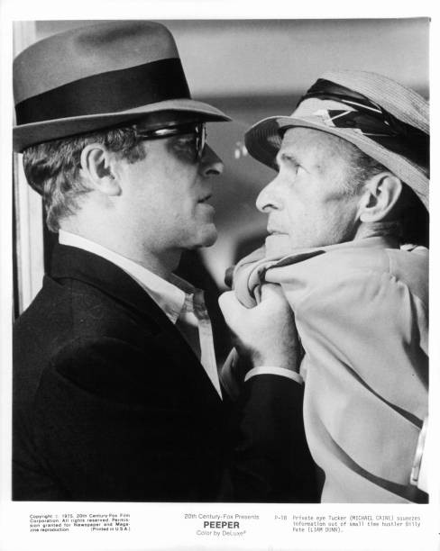 Michael Caine squeezes information out of small time hustler Liam – Old Photo