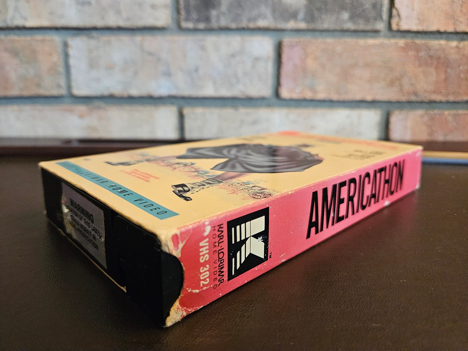 Americathon 1998 (VHS)-TESTED!!! – John Ritter-Fred Willard-Harvey Korman – GOOD