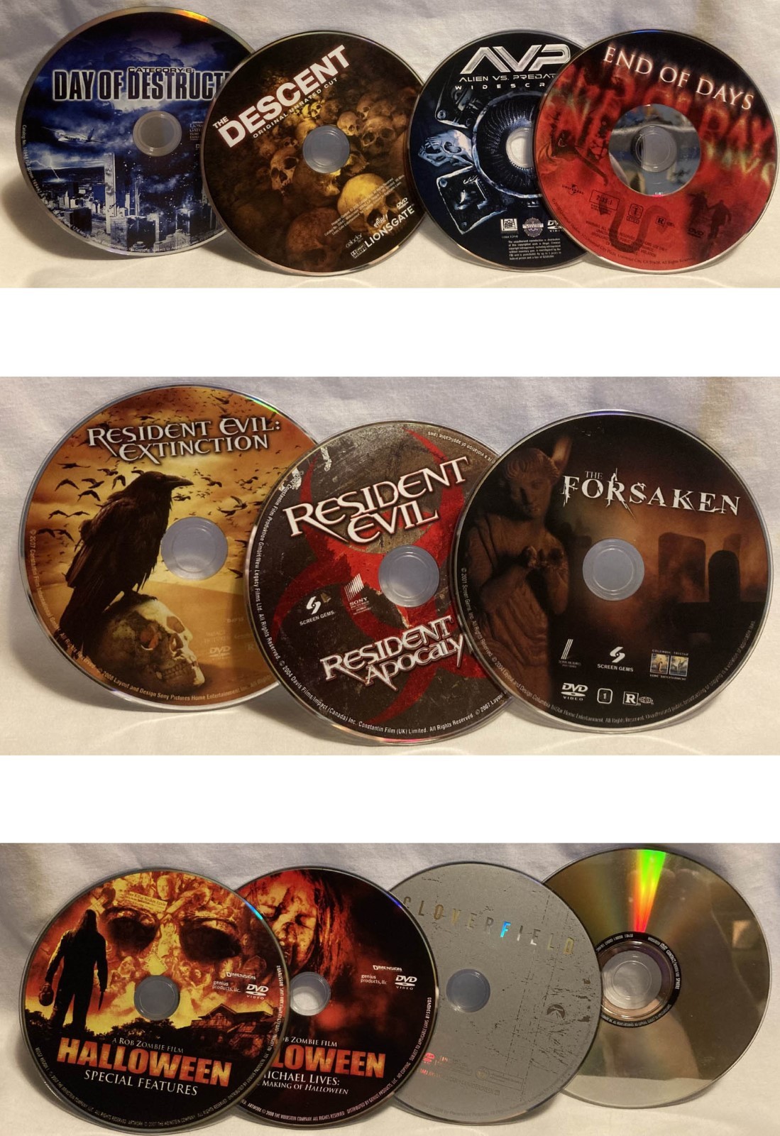 Lot -11 used DVDs Horror sci-fi fantasy action Halloween evil NO CASE PET RESCUE