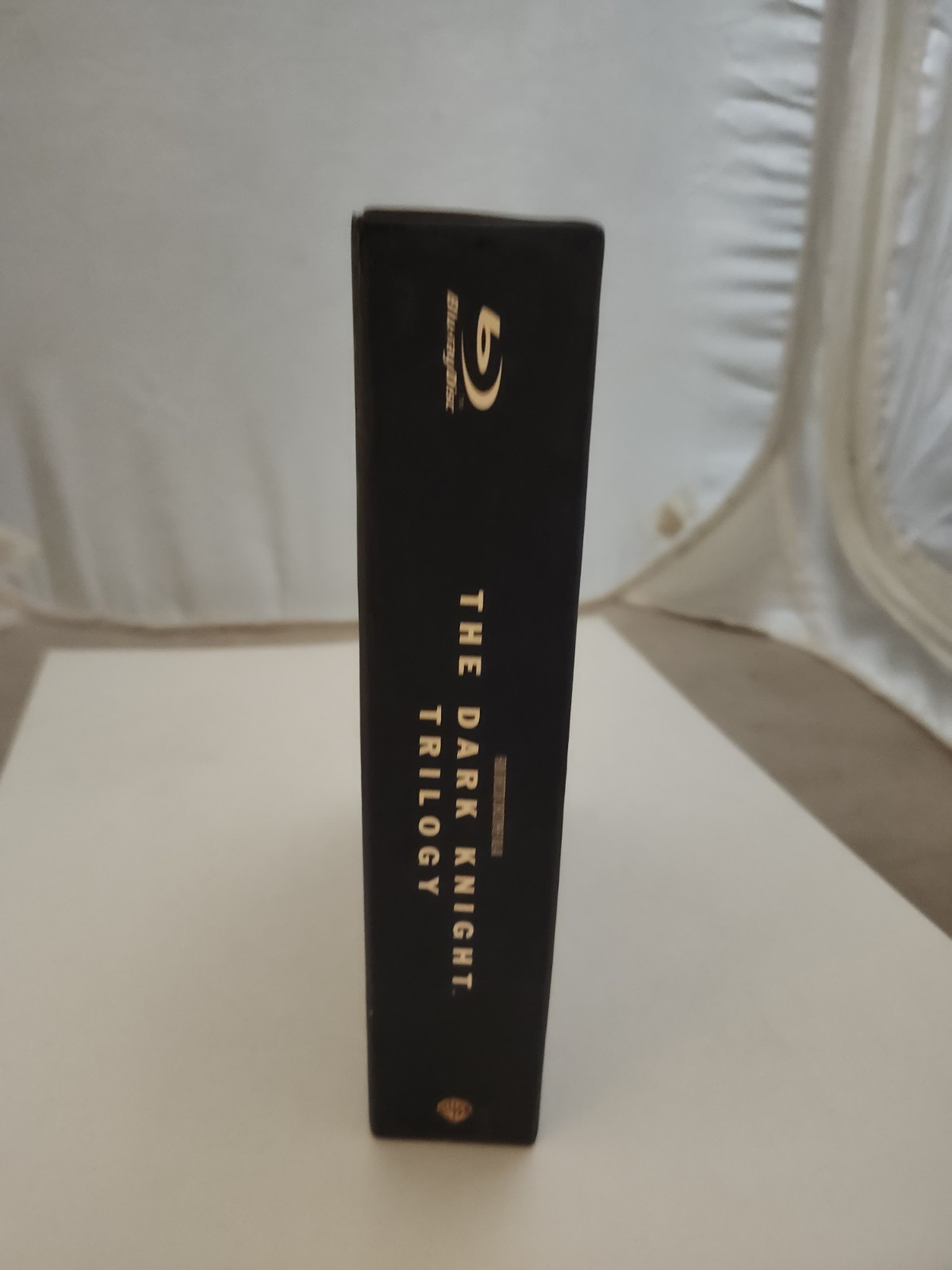 The Dark Knight Trilogy (Blu-ray) 5 Disc Set W/ Book. Used Excellent Condition